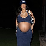 Rihanna shows off her huge baby bump while wearing denim and an LAFD hat at Nobu in West Hollywood