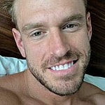 Shayne Jansen takes a selfie in bed