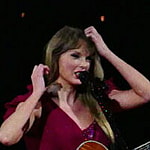 Taylor Swift has to fix her dress sleeve on opening night as her wardrobe falls apart during multimilion dollar tour in Arizona