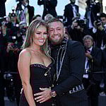 Conor McGregor and Dee Devlin on the Elvis red carpet at the Cannes film festival