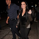 Kyle Richards and Mauricio Umansky show some PDA as they leave from Craig apos s eatery