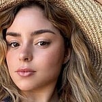 Demi Rose takes a selfie.