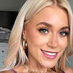 Boxer Elle Brooke takes a selfie in her purple lingerie.