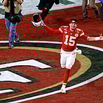 Patrick Mahomes (15) celebrates after he throws the game winning touchdown during NFL Super Bowl 58 LVIII