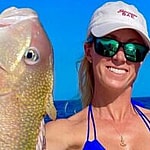 Vicky Stark shows off her big catches in a tiny blue bikini.