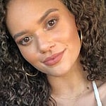 Madison Pettis smiles to the camera.