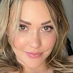 Mia Malkova smiling indoors