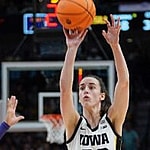 Caitlin Slark shooting a basketball