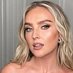 Perrie Edwards poses for the camera.
