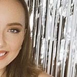 Hailie Jade smiling indoors