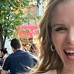 Erin Moriarty laughing outdoors