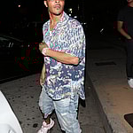 T.I and his wife Tiny were seen leaving Craigs Restaurant in A beautiful White Rolls Royce Convertible in West Hollywood, CA