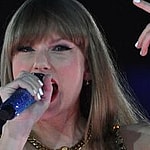 Taylor Swift singing at the Eras Tour