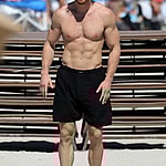 Logan Paul shows off his muscular physique as he hits the beach with bikini-clad girlfriend Nina Agdal in Miami. 23 Oct 2022 Pictured: Logan Paul; Nina Agdal. Photo credit: MEGA TheMegaAgency.com +1 888 505 6342 (Mega Agency TagID: MEGA910542_002.jpg) [Photo via Mega Agency]