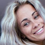 Paige VanZant smiles at the camera.