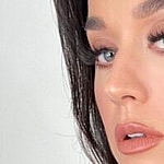 Katy Perry takes a selfie.