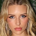 Lottie Moss strikes a pose for the camera.