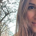 Alexandra Ianculescu smiles at the camera.