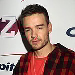 Liam Payne wearing a red shirt