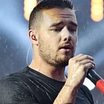 Liam Payne singing on stage