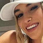 Kayla Simmons smiles at the camera.