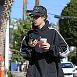 Justin Bieber is seen grabbing a coffee on his own