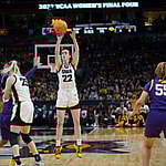 Caitlin Clark shooting a basketball during the championship game against LSU in 2023.
