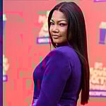 Photo collage of Garcelle Beauvais and Erika Jayne.