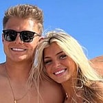 Zach Wilson and Nicolette Dellano smile for the camera.
