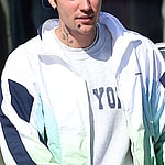 Justin Bieber with stickers on his face