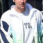 Justin Bieber with stickers on his face