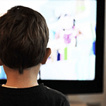 Kid watching tv