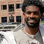 Sheduer Sanders and mom Pilar posing together.