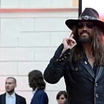 Billy Ray Cyrus and Elizabeth Hurley on the red carpet