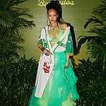 Fashion icon Rihanna wears a neon tutu dress with a bikini top and her latest Puma Avanti LS sneakers at a Fenty x Puma party in her home country of Barbados on March 11., Rihanna completed her eye-catching look with a baseball jersey as she partied with guests including Puma athletes Skylar Diggins-Smith, Charokee Young, and Shericka Jackson, along with Serena Page, Kordell Beckham, Achieng Agutu, Isan Elba, Avani, Rickey Thompson, Jaida Buni, Nate White., The new Fenty x Puma collection is now available worldwide at PUMA.com, Puma flagship stores and select global retailers., *MANDATORY BYLINE - MUST CREDIT: Dennis Leupold/PUMA/Mega. 11 Mar 2025 Pictured: Rihanna celebrates the new Fenty x Puma collection with a release party in Barbados. *MANDATORY BYLINE - MUST CREDIT: Dennis Leupold/PUMA/Mega. Photo credit: Dennis Leupold/PUMA/Mega TheMegaAgency.com sales@mega.global (Mega Agency TagID: MEGA1282827_001.jpg) [Photo via Mega Agency]