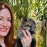 Mikayla Raines holding foxes