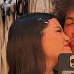 Selena Gomez kissing Benny Blanco on cheek