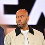 Alex Rodriguez and Derek Jeter standing next to each in other in a photo.