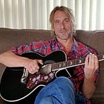 Todd Snider playing guitar