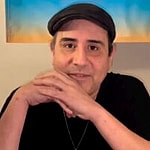 Jeff Garcia sitting at a table