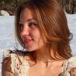 Anya Lacey posing for the camera in snow