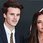 Cruz Beckham and Victoria Beckham on the red carpet.