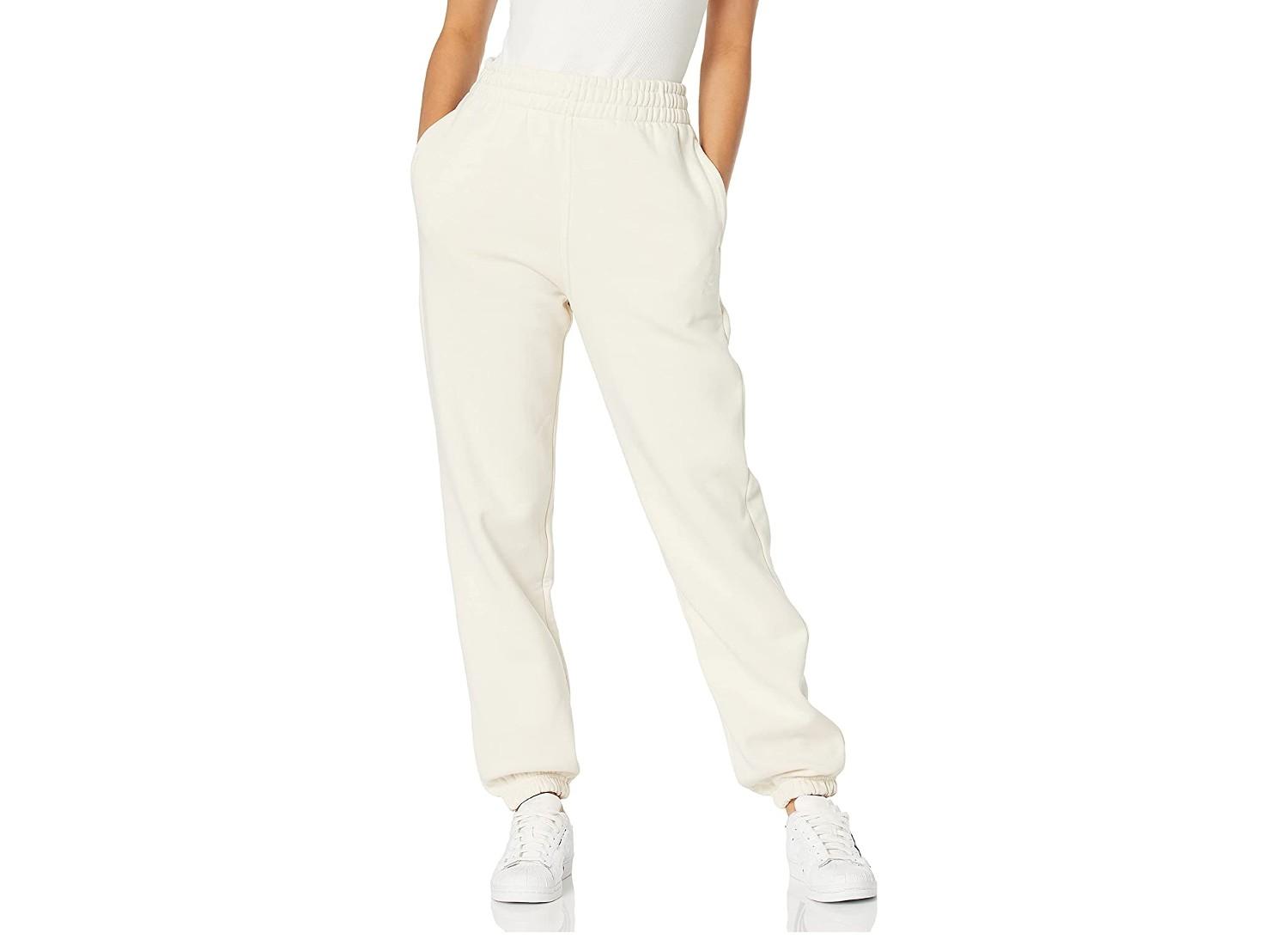 A pair of wonder white Adidas women's joggers.