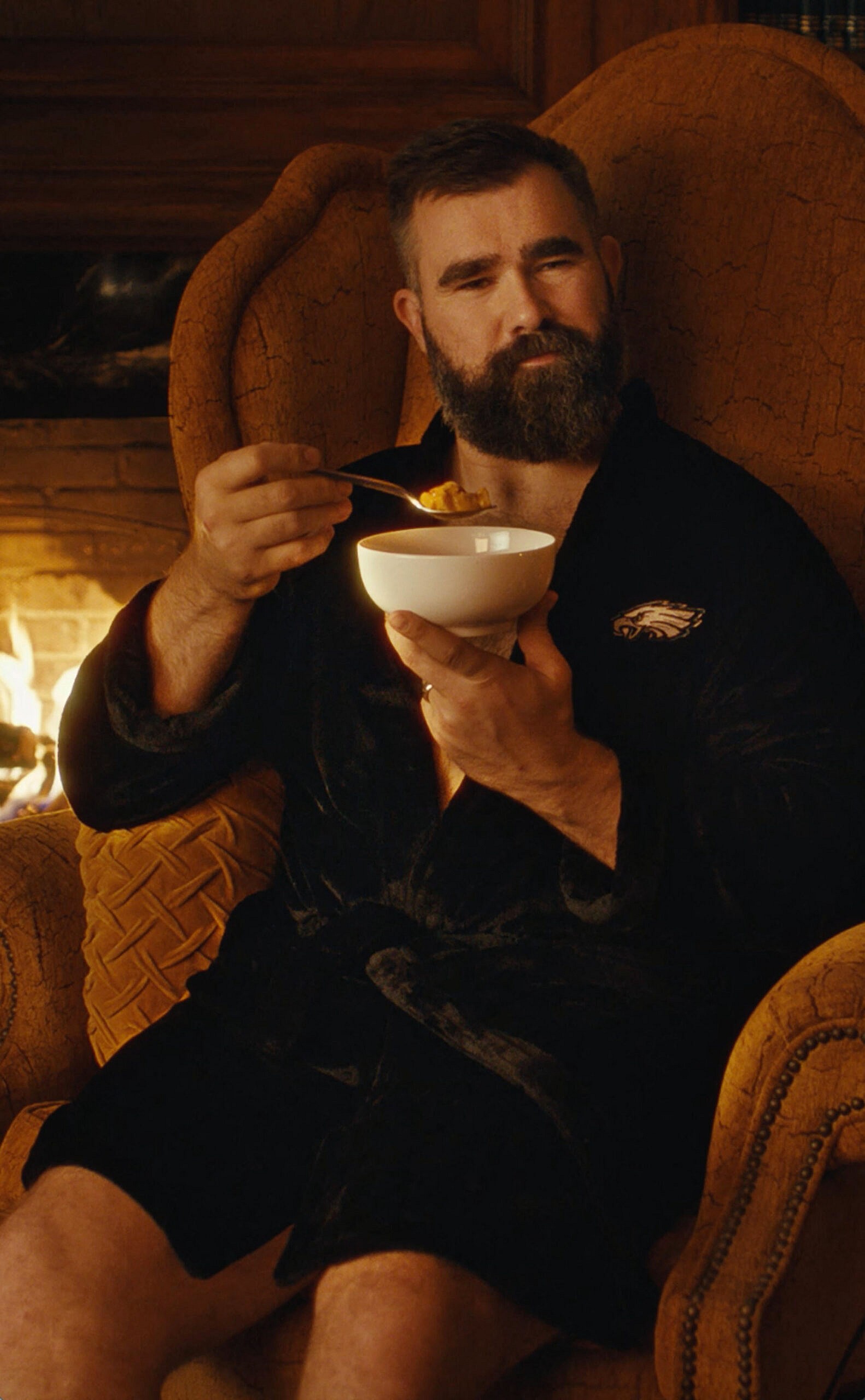 Jason Kelce posing in a robe for Chunky soup.