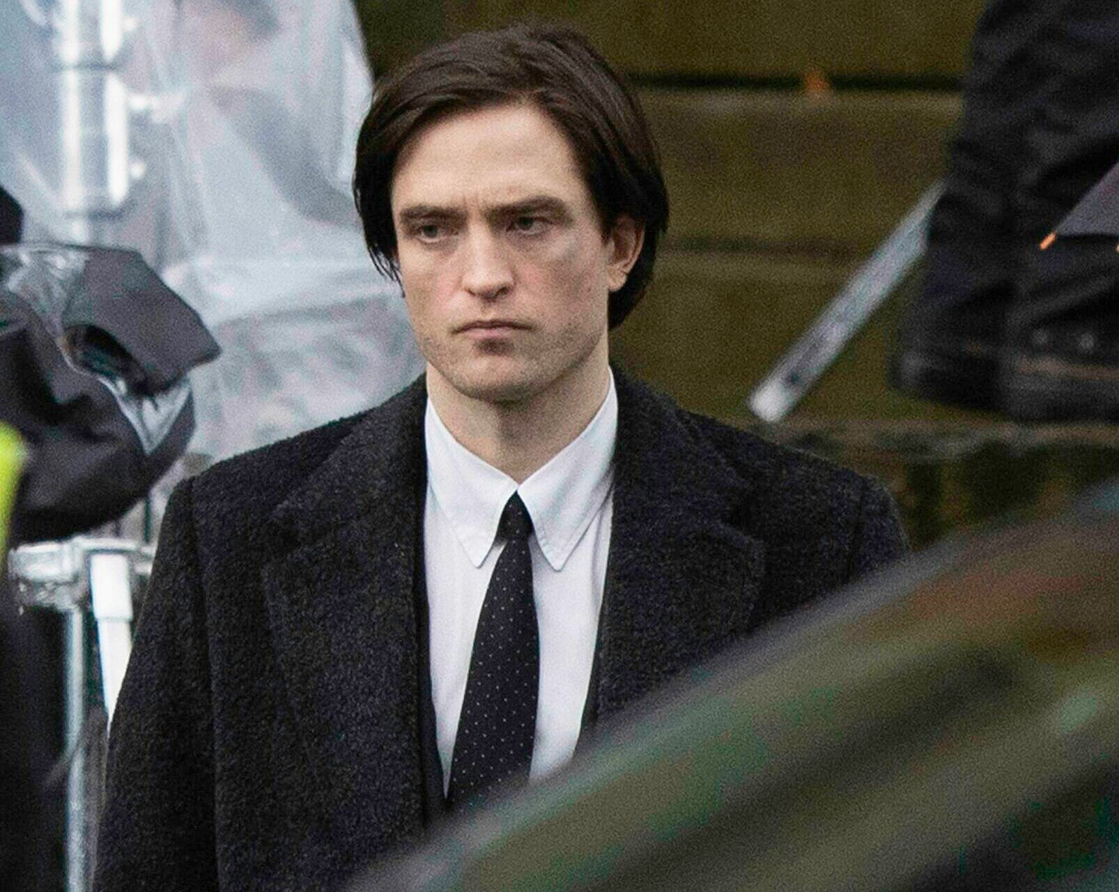 Robert Pattinson wears a covid face mask between takes filming Batman in Liverpool, UK.