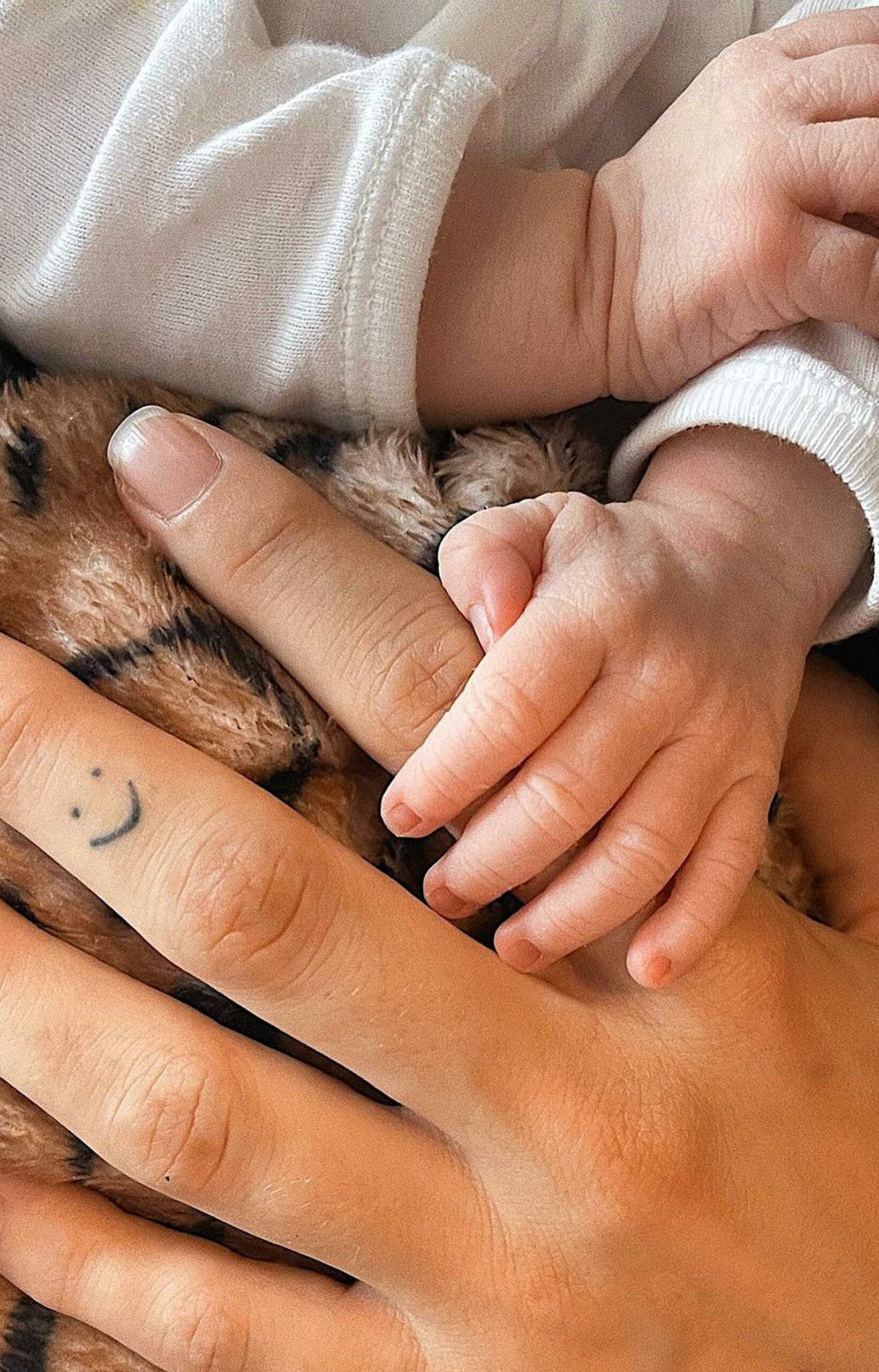 KJ Apa's son's hand