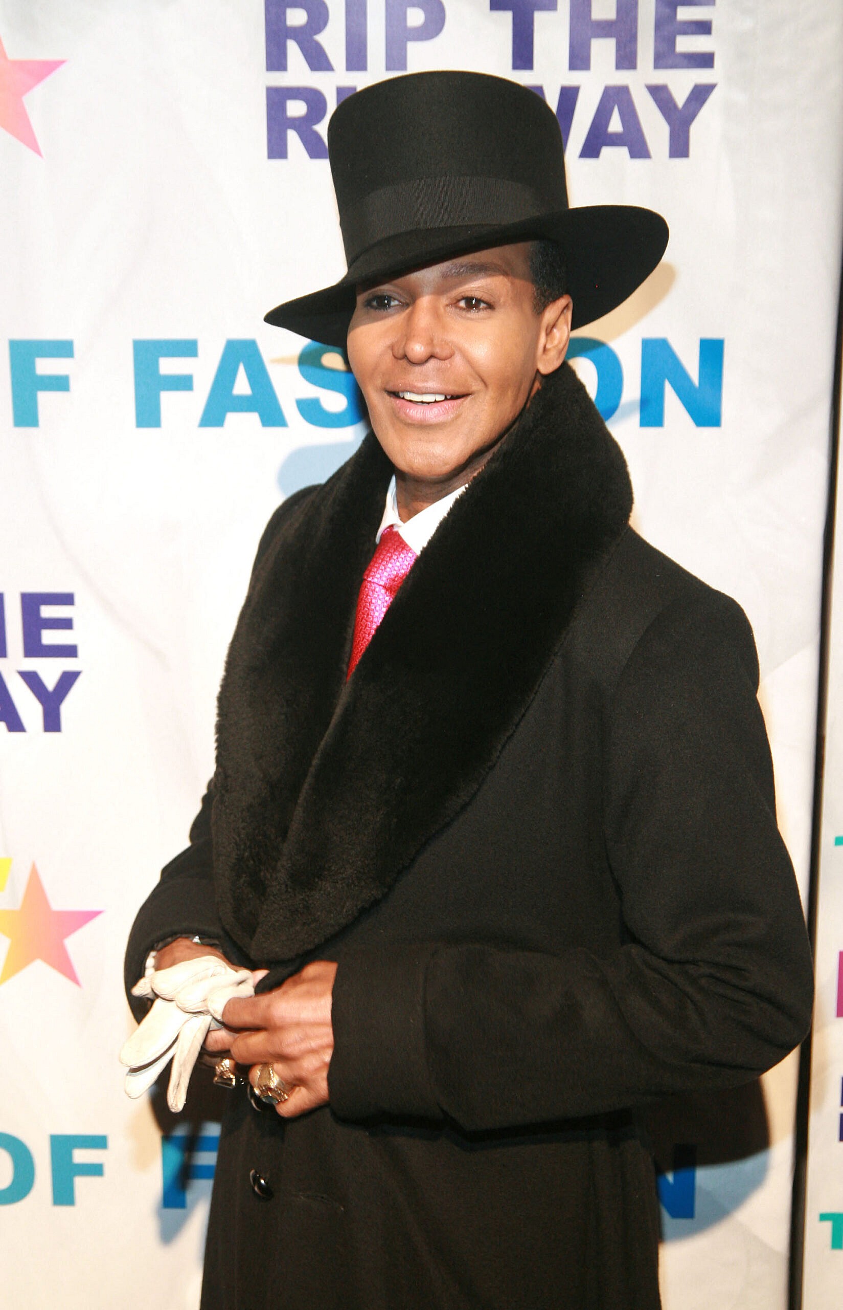 Dwight Eubanks posing on the red carpet. 