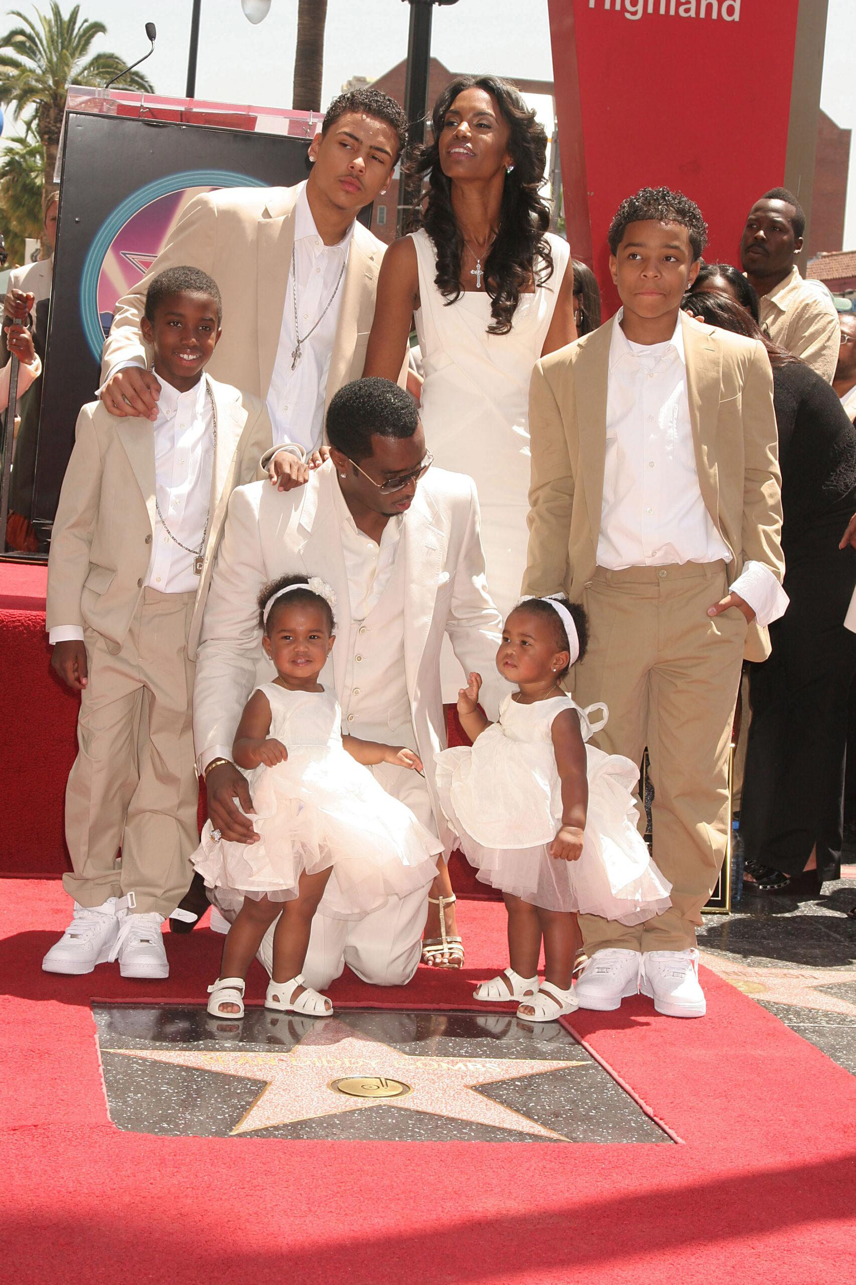 Kim Porter and Diddy with their kids