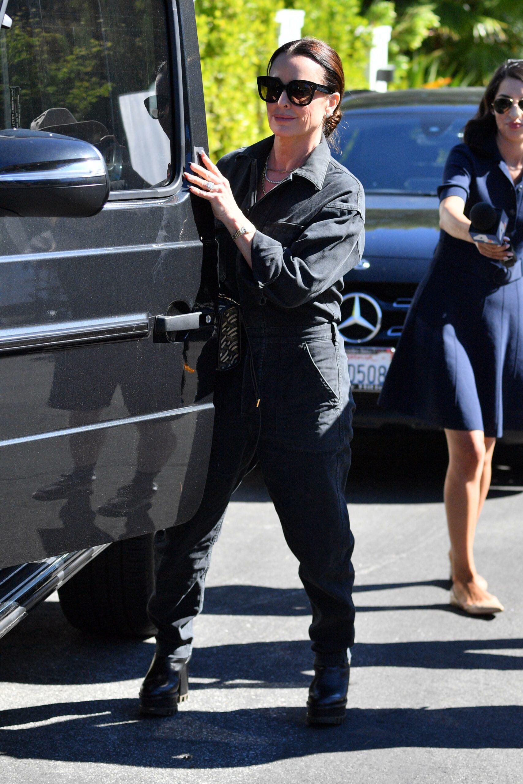 Kyle Richards is seen leaving the home of RHOBH star Dorit Kemsley who was reportedly held at gunpoint by 3 men and robbed of jewelry and handbags during 20-minute home invasion