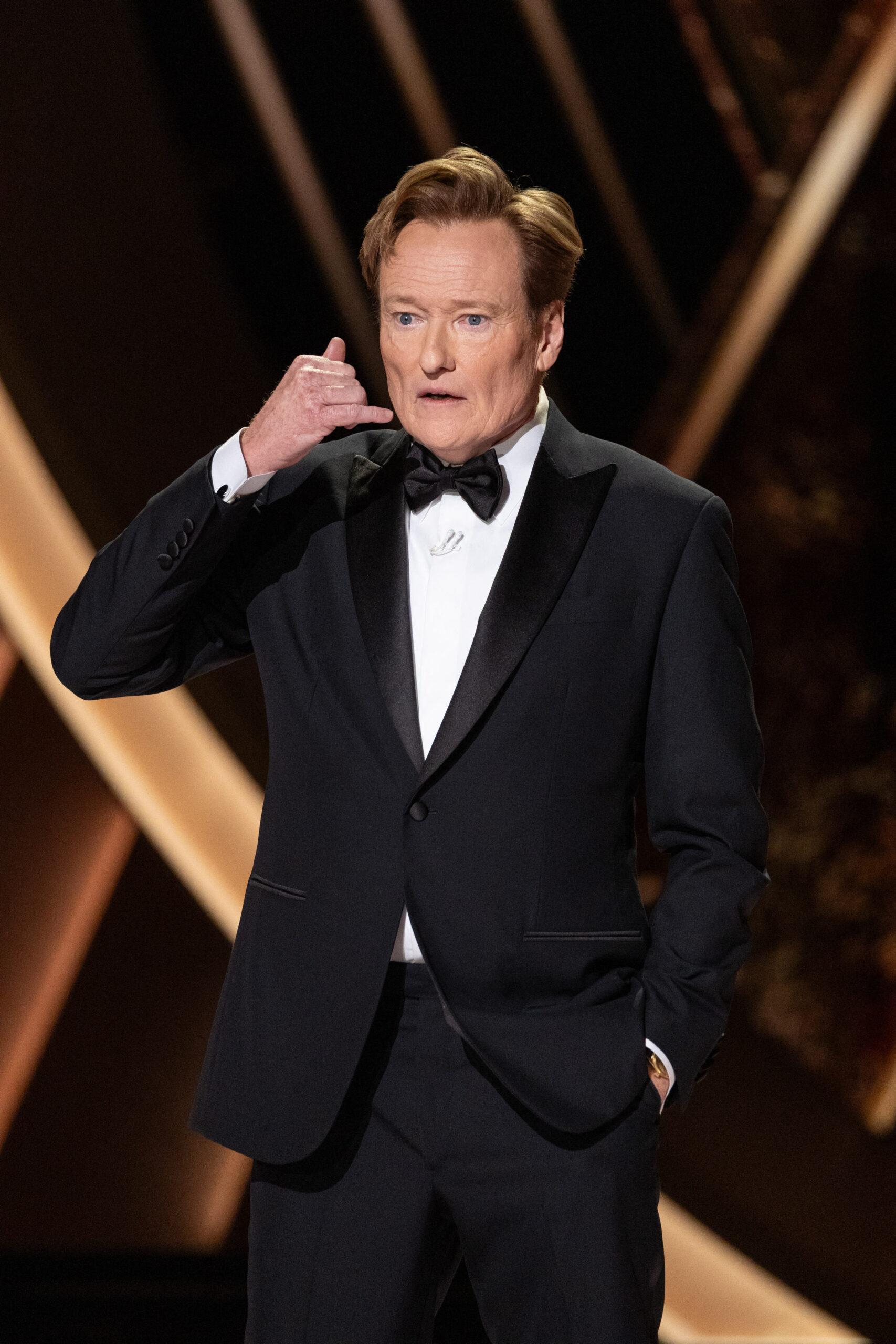 Wearing a black tux